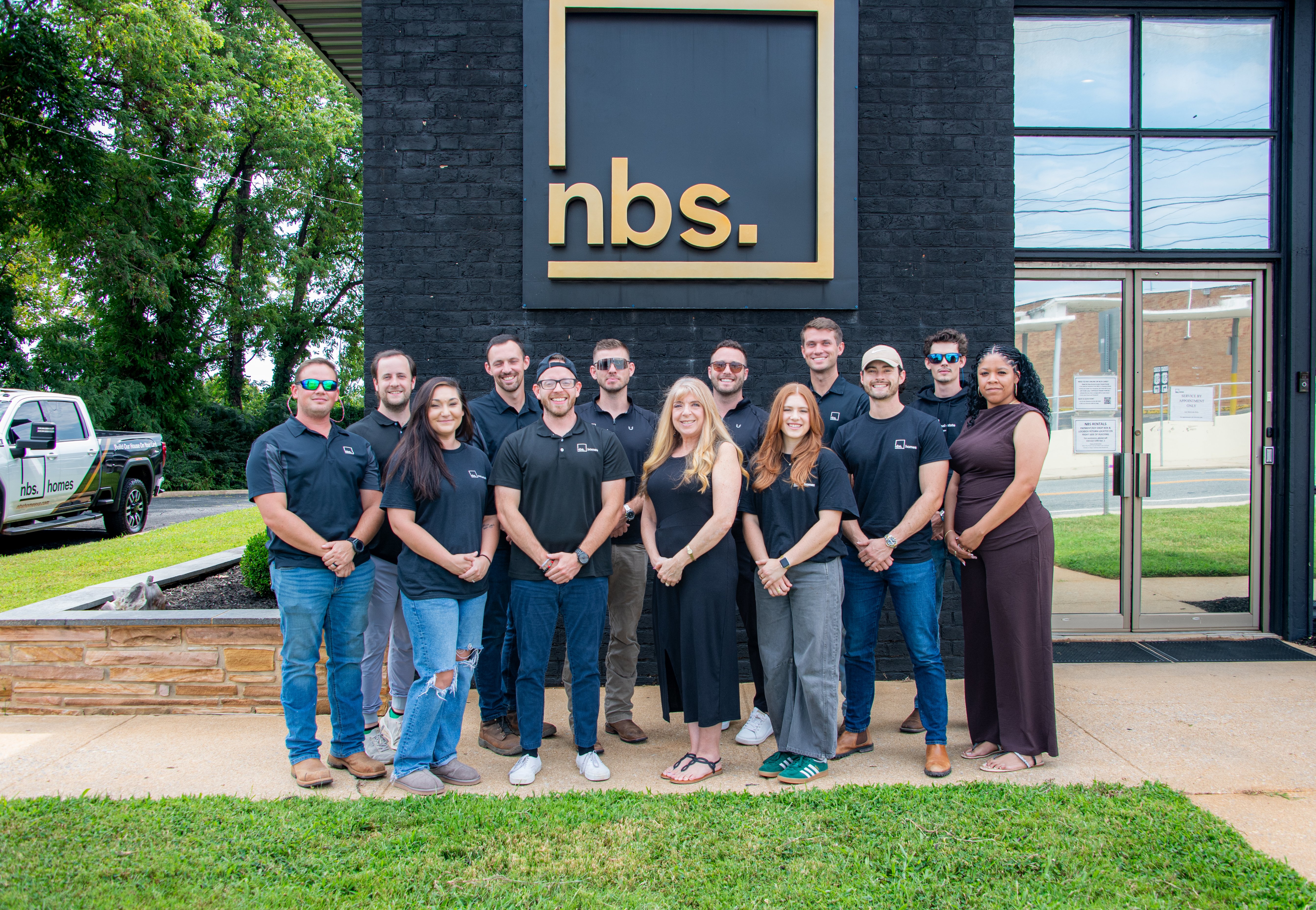 NBS Homes team together outside the office